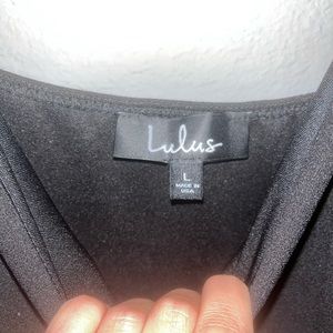 Lulus black bodycon dress with ruffles sides.